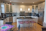 Kitchen, island and breakfast areas